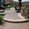 Patio with border along edges with expossed aggregate