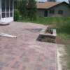 Paver brick patio with planter