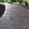 Stamped concrete driveway with bordered edges